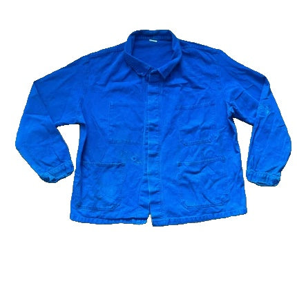 Vintage Dressing blue chore jacket with pointed collar, button front, and utility patch pockets.