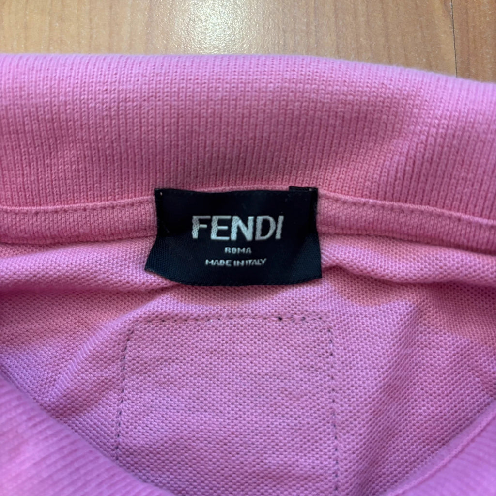 Fendi pink polo shirt with embroidered heart patch and branded buttons, cotton pique fabric.