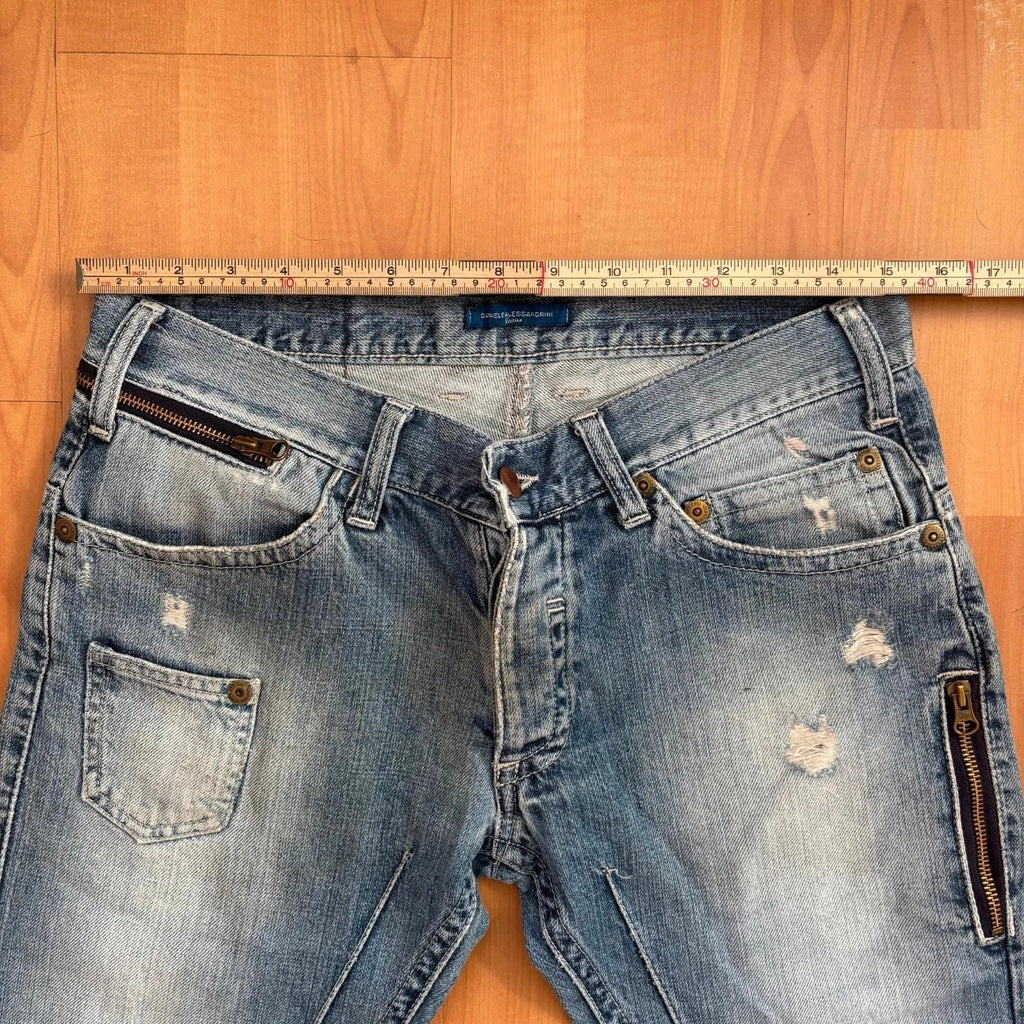 Daniele Alessandrini blue straight jeans with distressed details and front zip pockets.
