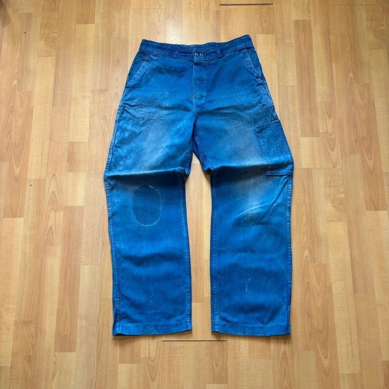Vintage Dressing blue wide-leg trousers with knee patch and classic utility side pocket.