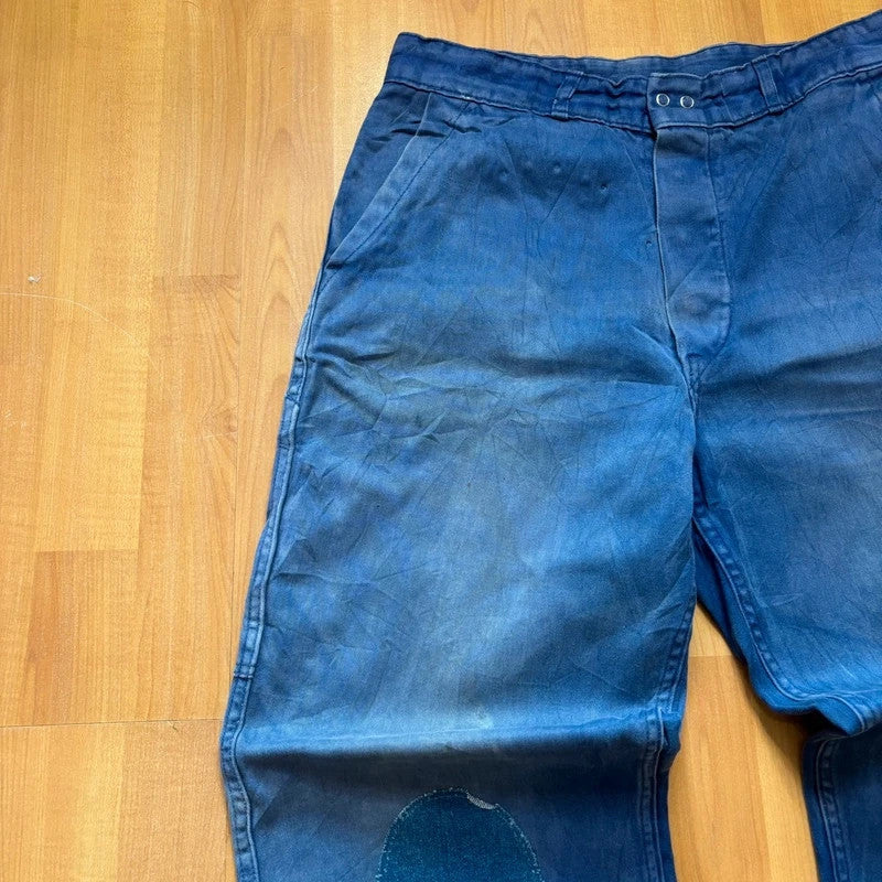 Vintage Dressing blue wide-leg trousers with knee patch and classic utility side pocket.