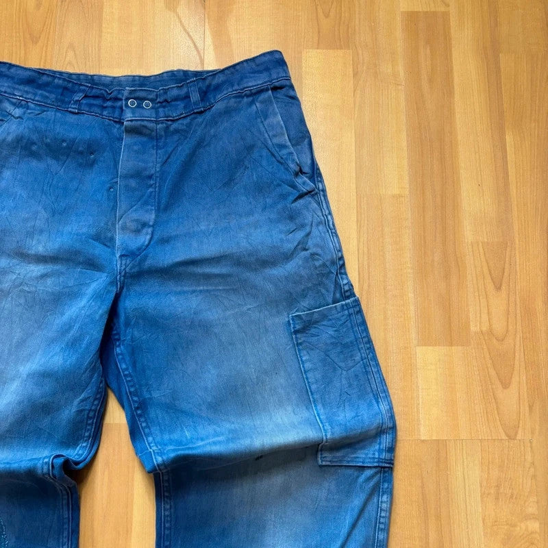 Vintage Dressing blue wide-leg trousers with knee patch and classic utility side pocket.