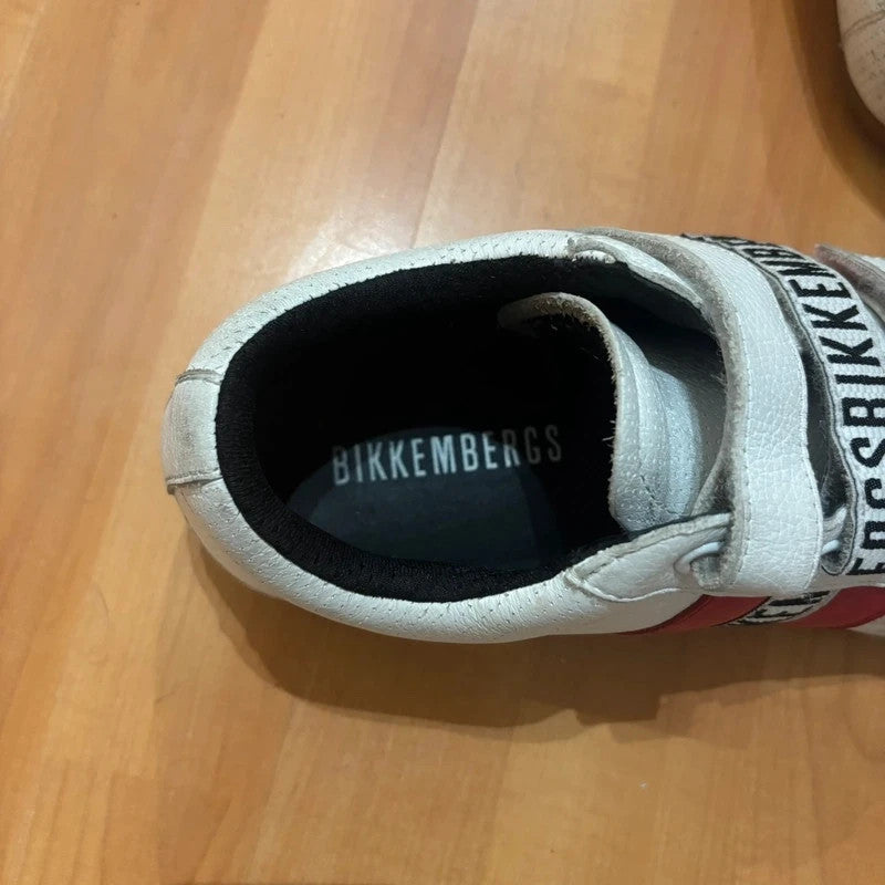 Bikkembergs red and white trainers with velcro straps, perforated leather, and suede accents.