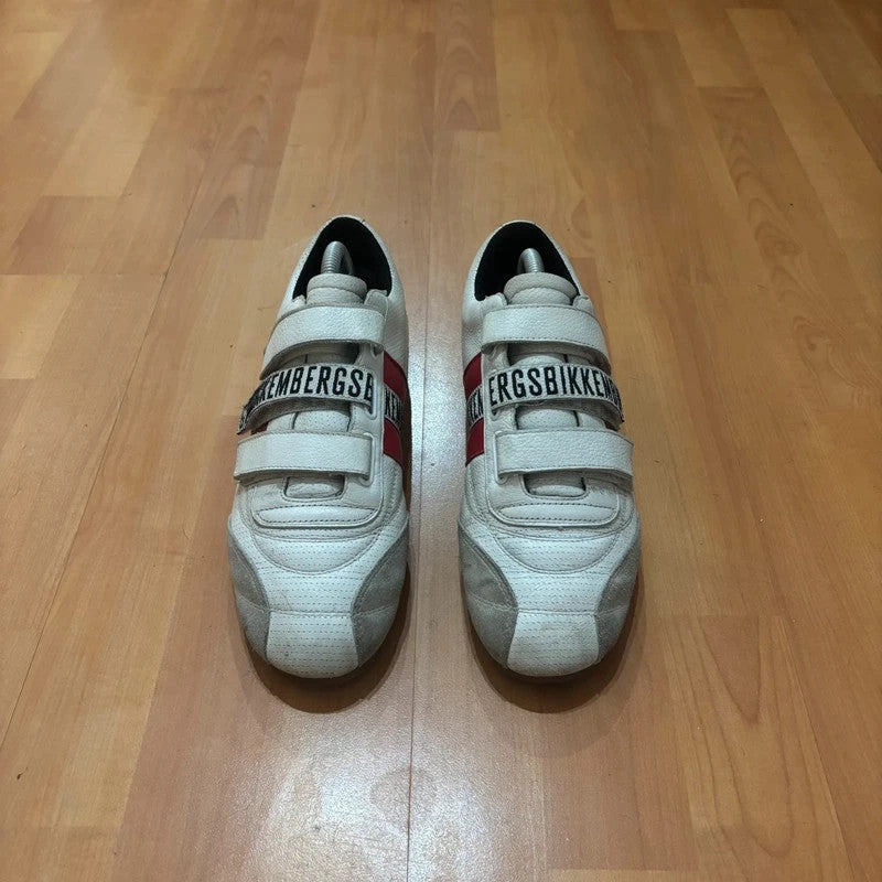 Bikkembergs red and white trainers with velcro straps, perforated leather, and suede accents.