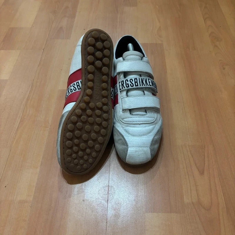 Bikkembergs red and white trainers with velcro straps, perforated leather, and suede accents.
