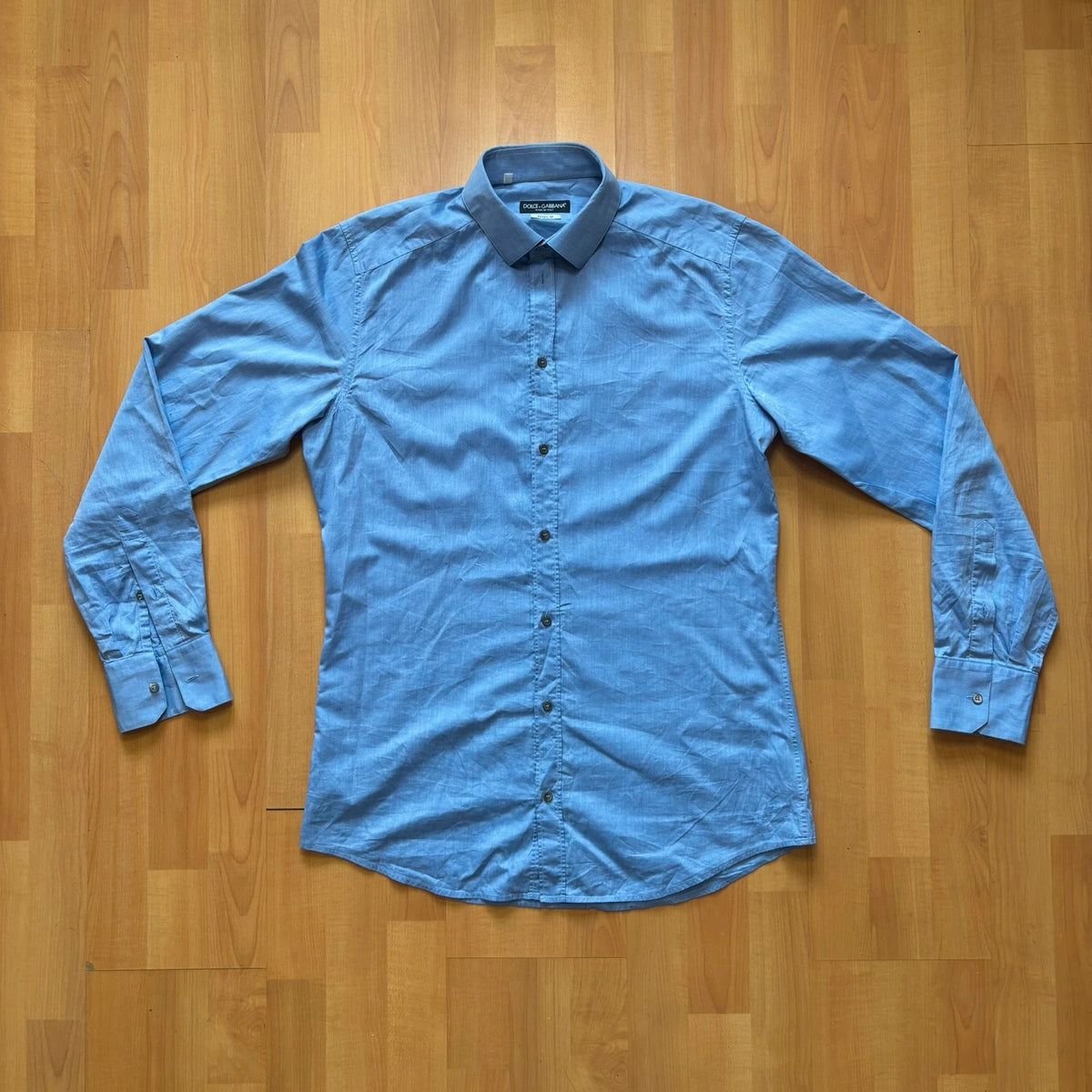 Dolce & Gabbana blue dress shirt tailored "Gold" fit with premium buttons and Italian craftsmanship.