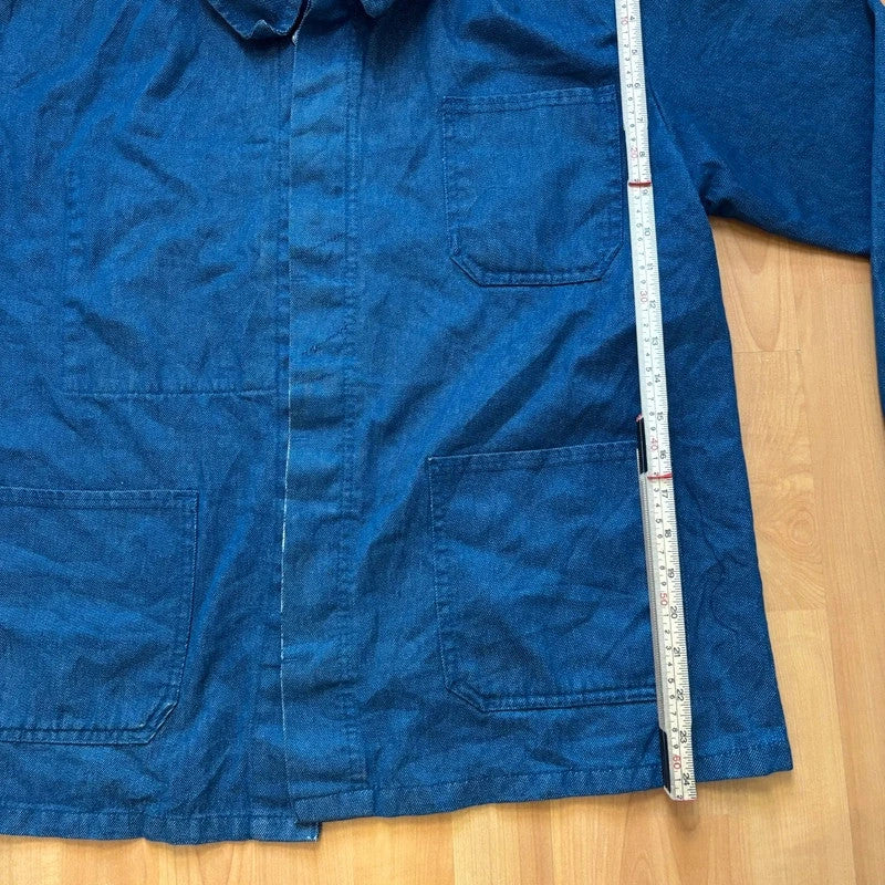Vintage Dressing blue chore jacket with pointed collar, button front, and utility patch pockets.