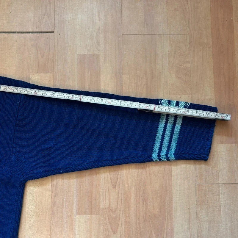 Stone Island grey and navy wool roll neck sweater with compass patch and striped details.