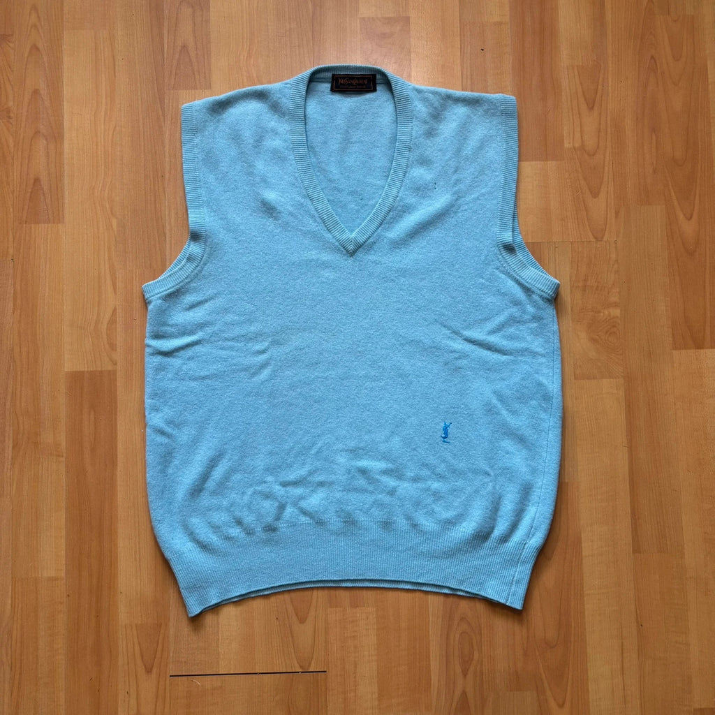 Yves Saint Laurent blue knitted vest with embroidered logo and ribbed detailing.