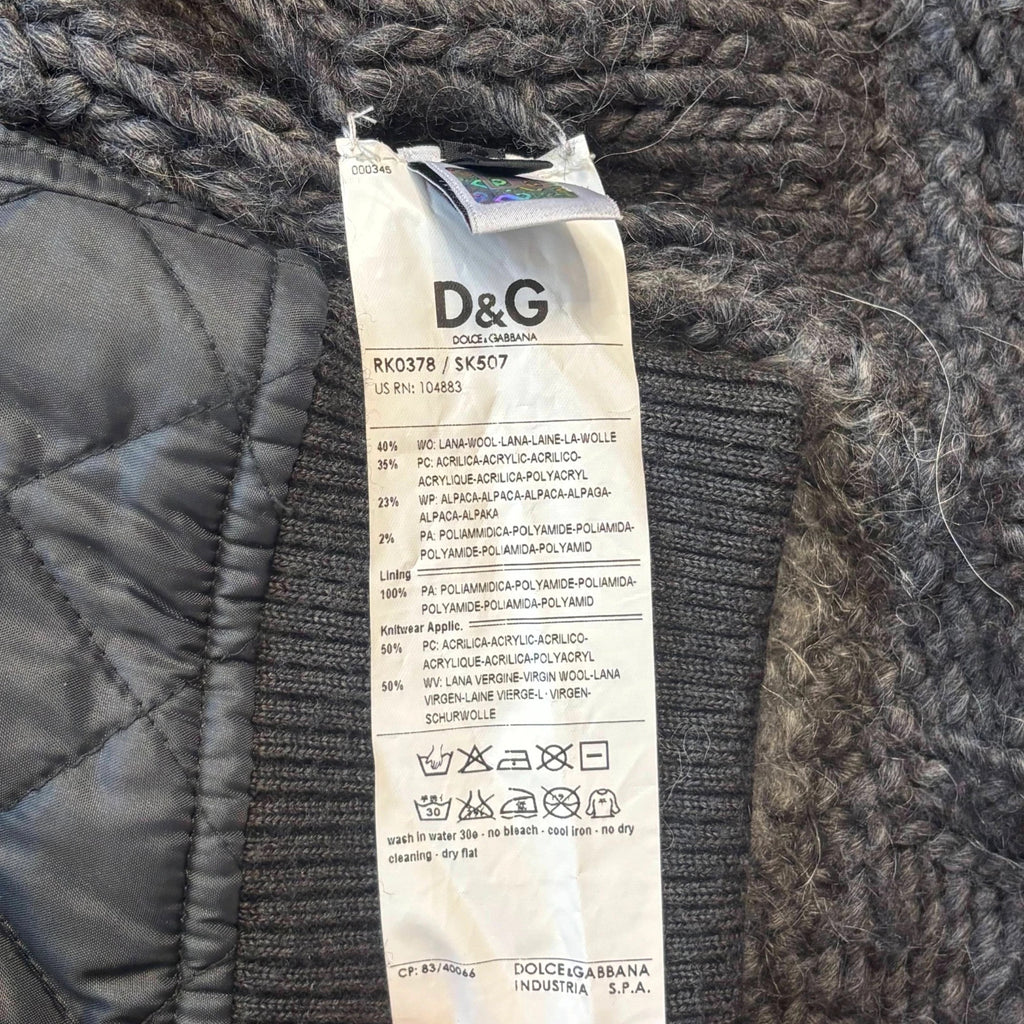 Dolce & Gabbana black and grey chunky knit cardigan with removable quilted bomber jacket.