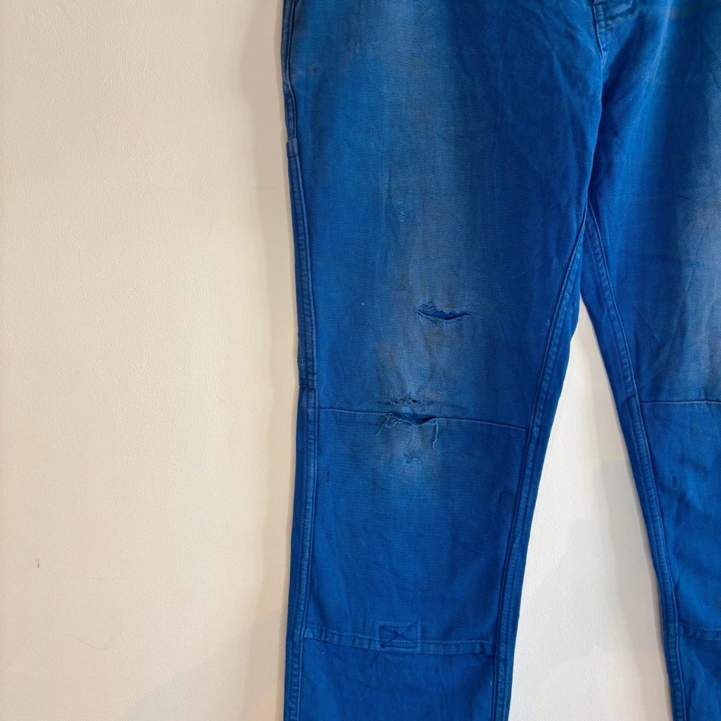 Vintage Dressing blue wide-leg trousers with double knees and utility pocket detailing.