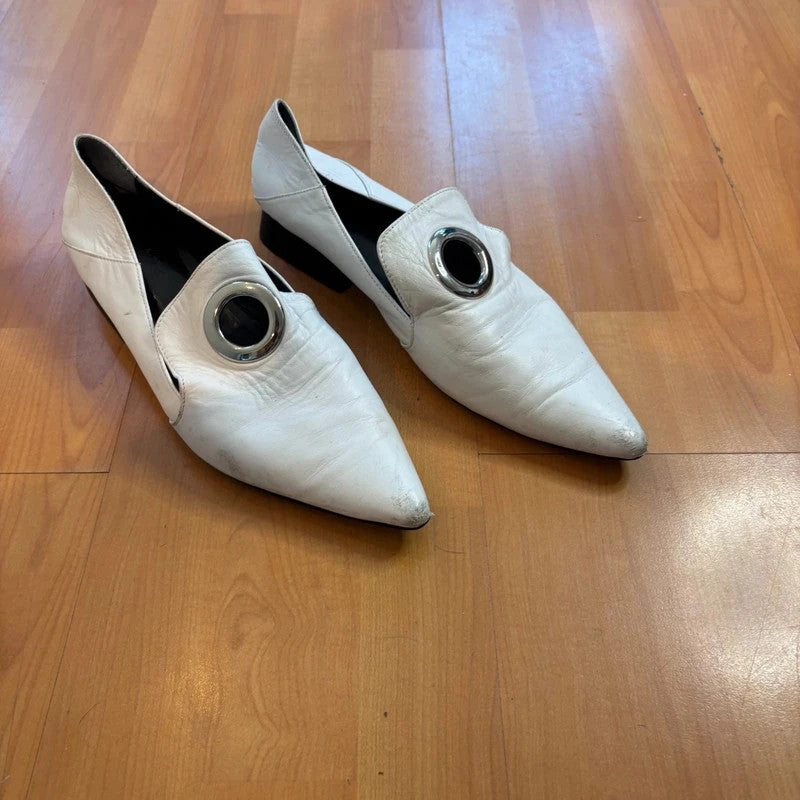 YUUL YIE white leather pointed toe heels with hardware ring detail and low block heel.