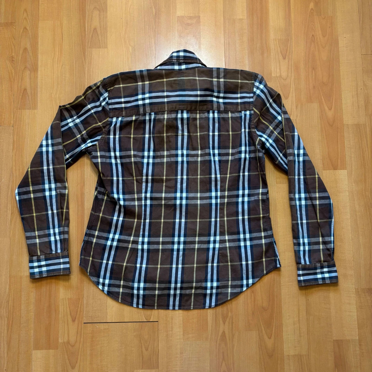Burberry men's button-up shirt blue and brown plaid with knight logo embroidered on chest.