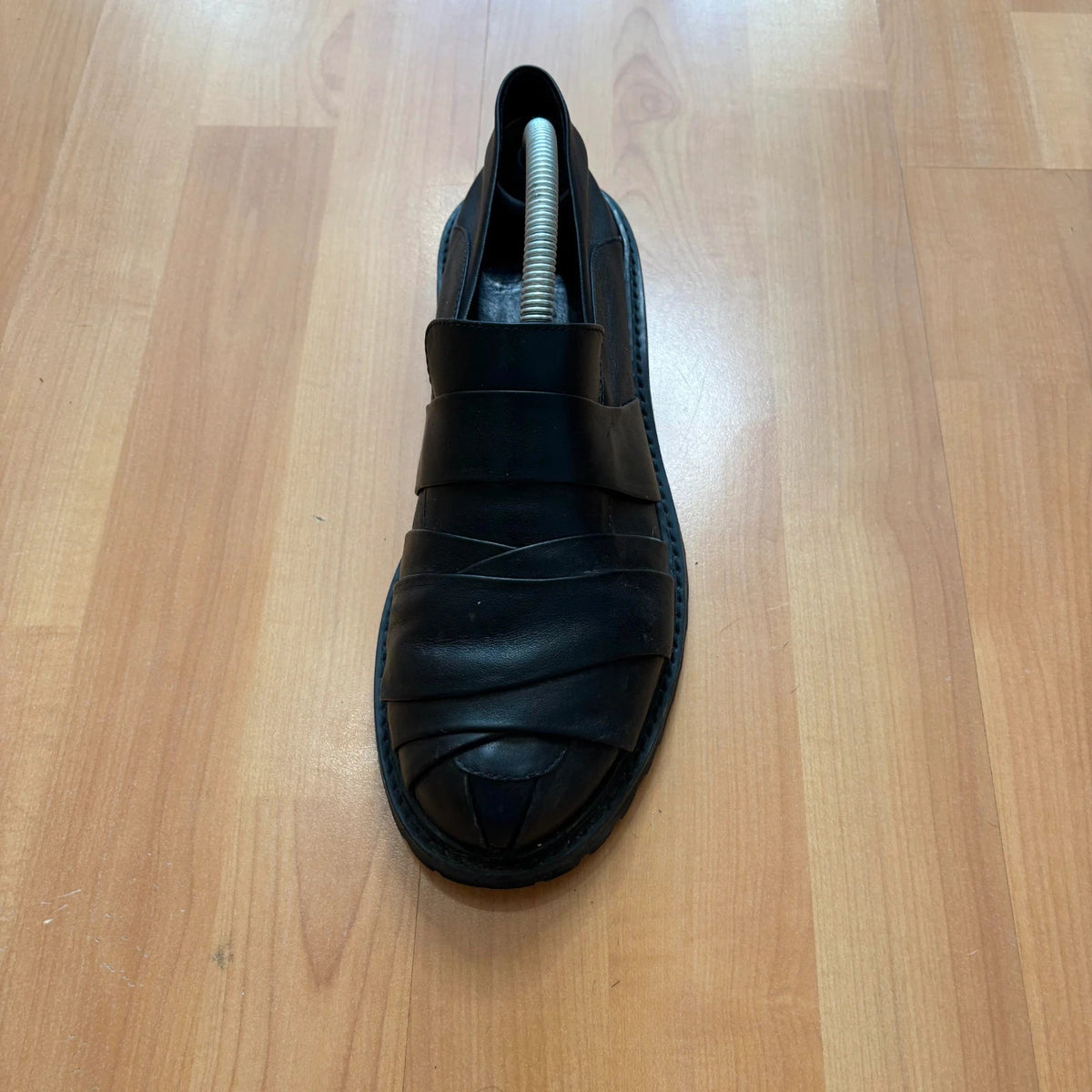 Rotten Closet black leather Morph Mules with collapsible heel and rugged vibram soles.