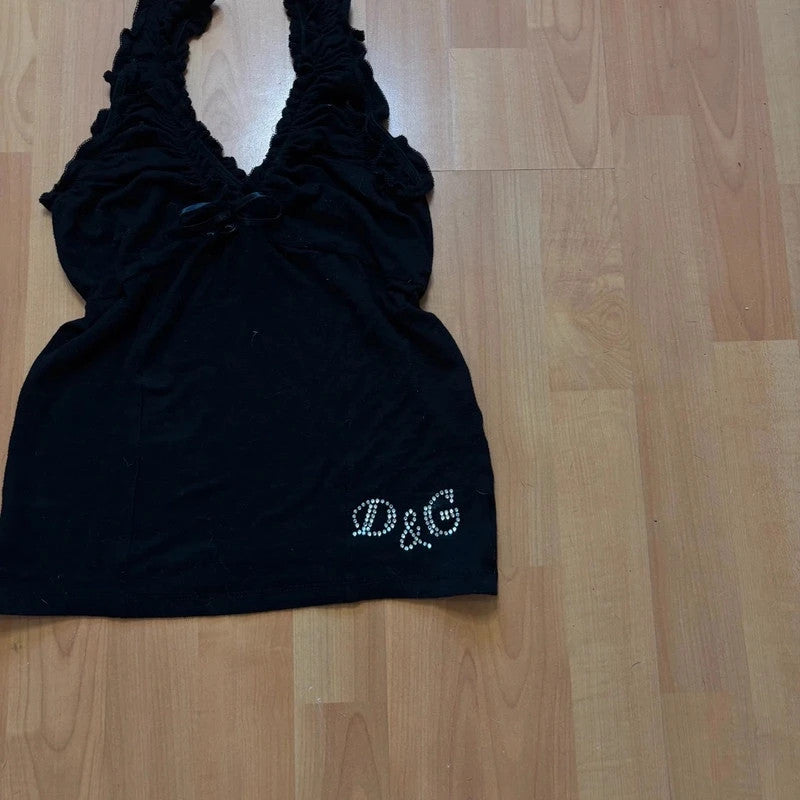 Dolce & Gabbana black cami tank top with ruffled neckline and rhinestone logo detail.