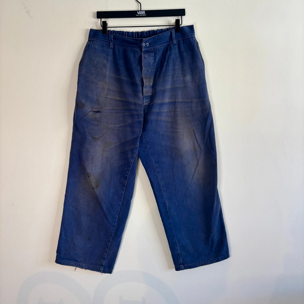 Vintage Dressing navy wide-leg trousers with embroidered logo patch and super-distressed moleskin fabric.