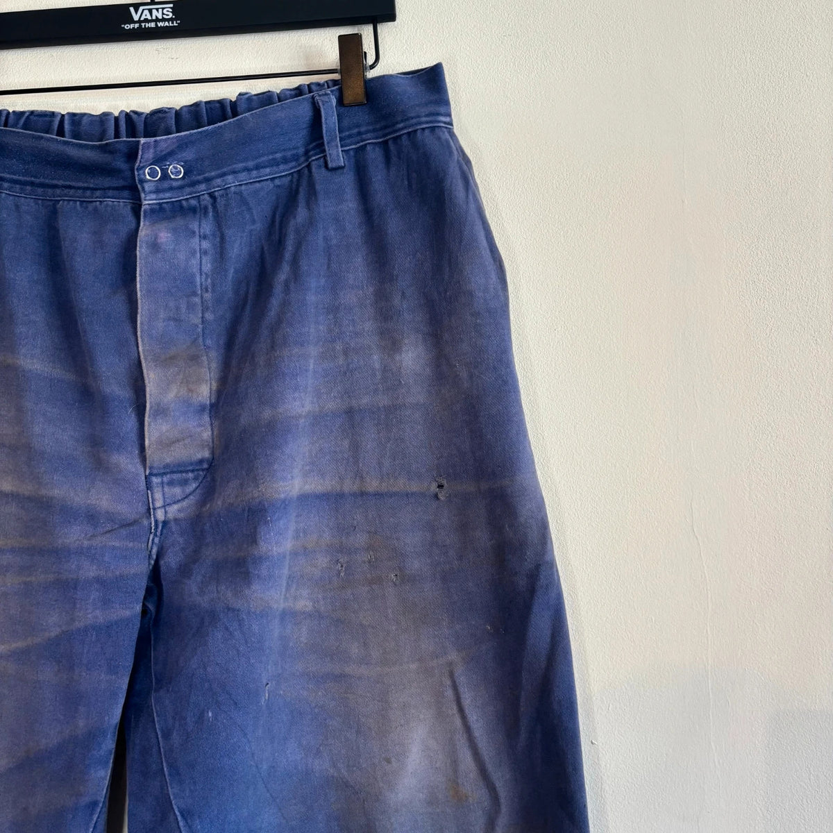 Vintage Dressing navy wide-leg trousers with embroidered logo patch and super-distressed moleskin fabric.