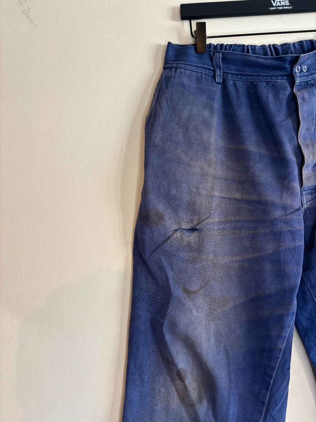 Vintage Dressing navy wide-leg trousers with embroidered logo patch and super-distressed moleskin fabric.