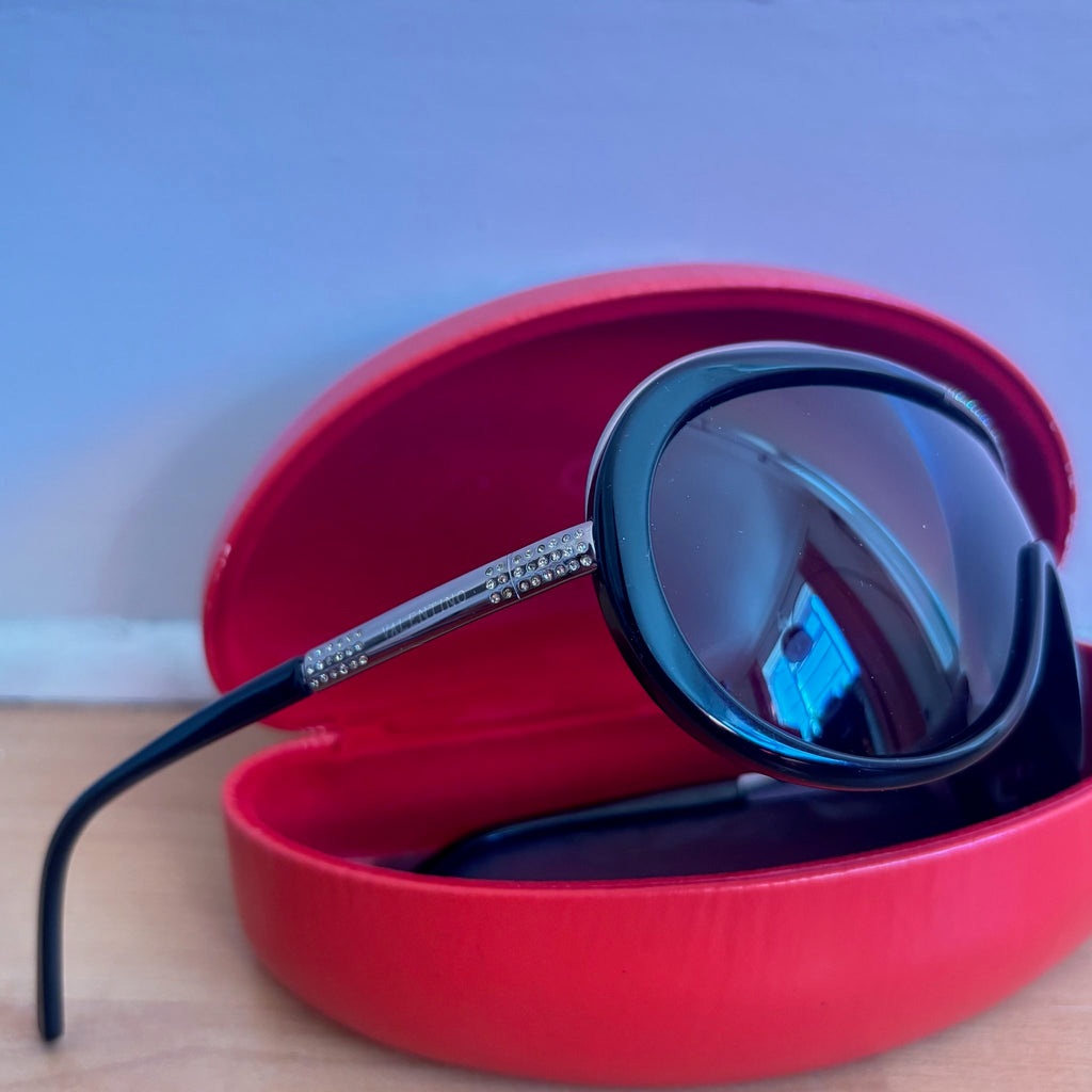 Valentino black sunglasses with rhinestone detailing and red hard case featuring logo.