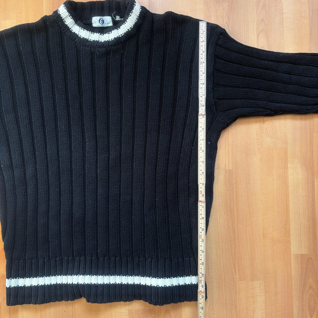 GOOD ENOUGH black and white knitted fisherman sweater with ribbed texture and striped collar.