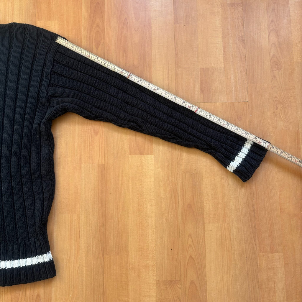 GOOD ENOUGH black and white knitted fisherman sweater with ribbed texture and striped collar.