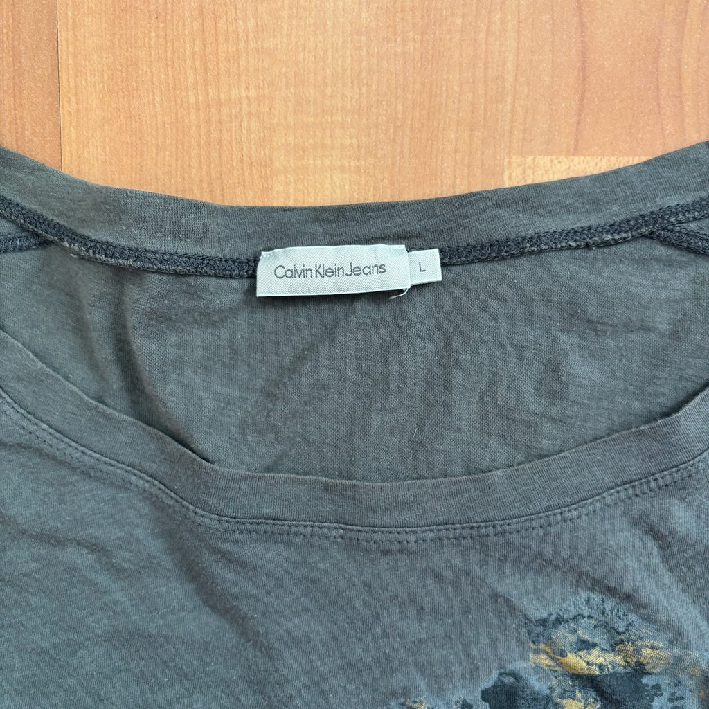 Calvin Klein grey long sleeve T-shirt large with faded 'ck' graphic print and round neckline.