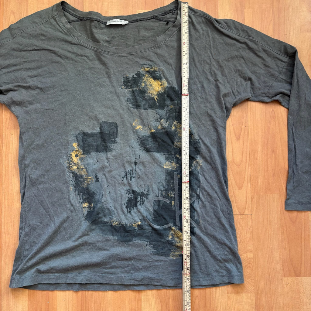 Calvin Klein grey long sleeve T-shirt large with faded 'ck' graphic print and round neckline.