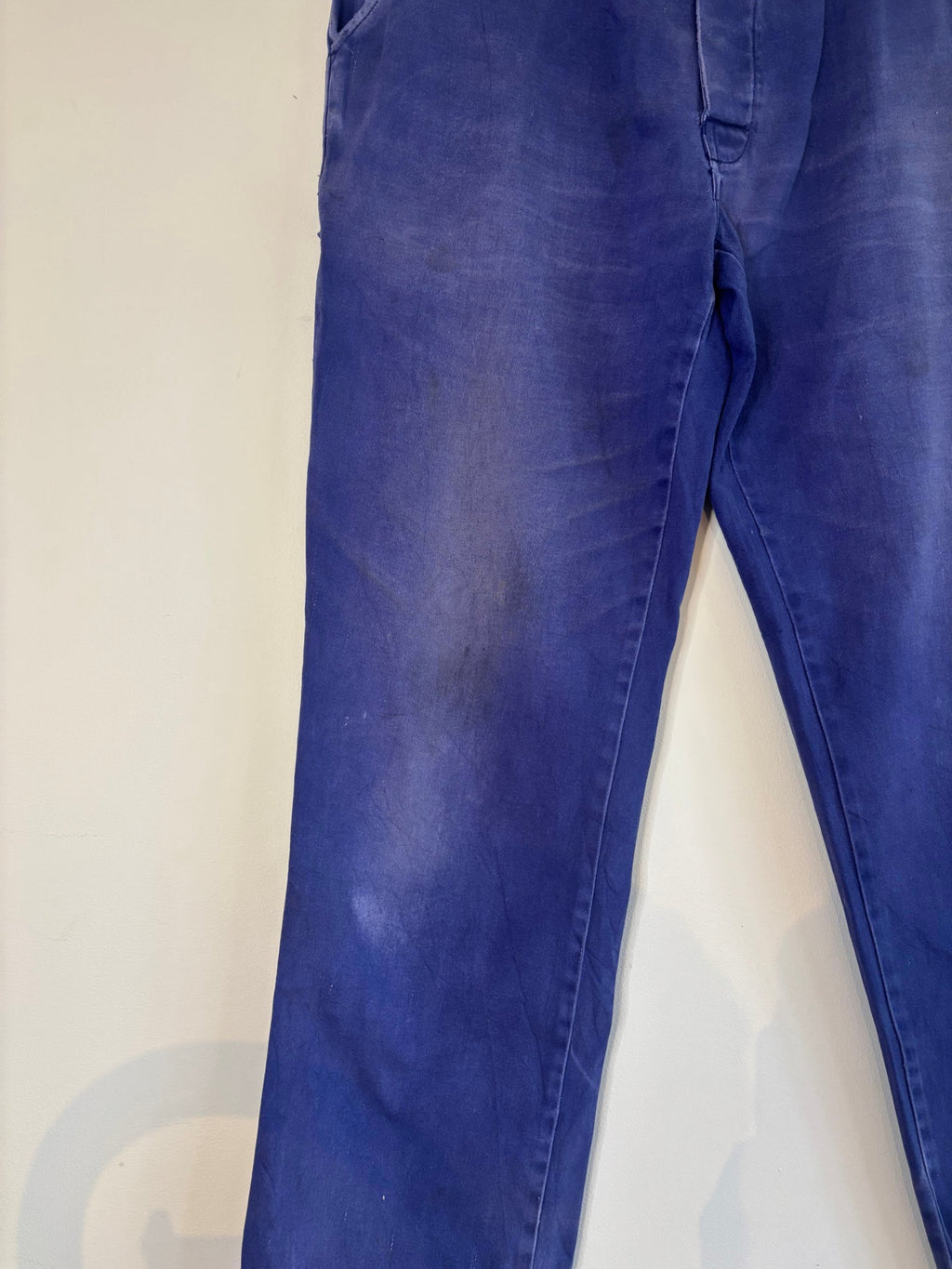 Workwear blue moleskin trousers with snap-button fly and utility pockets, vintage style.
