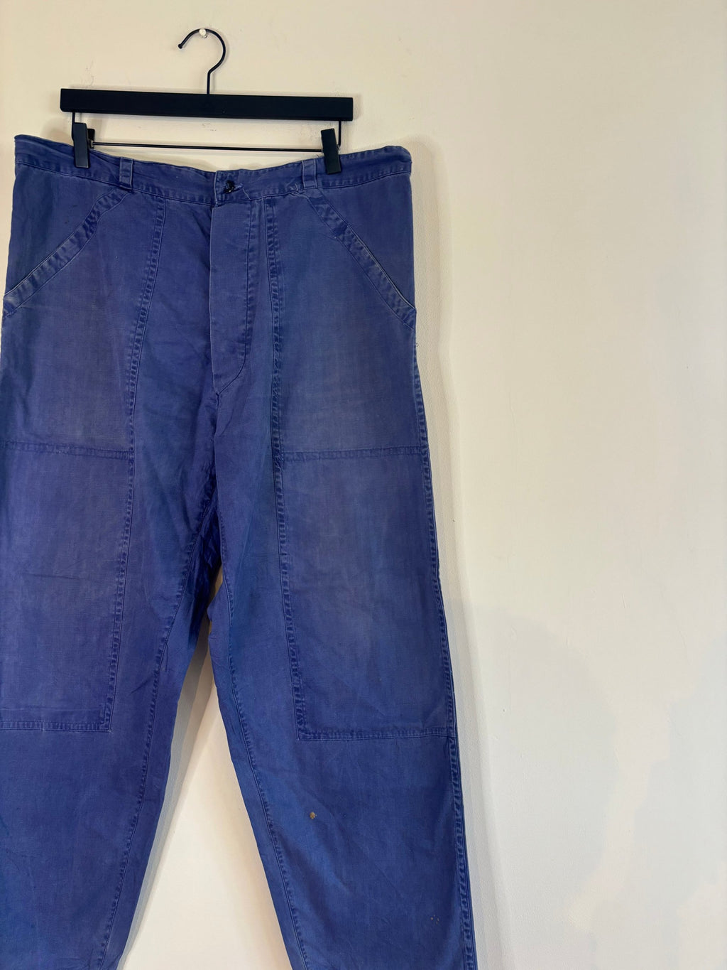 Vintage blue cotton twill pants with double-knee panels and adjustable back-buckle cinch.