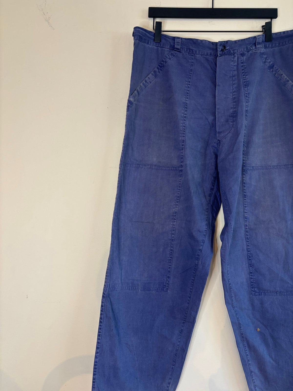 Vintage blue cotton twill pants with double-knee panels and adjustable back-buckle cinch.