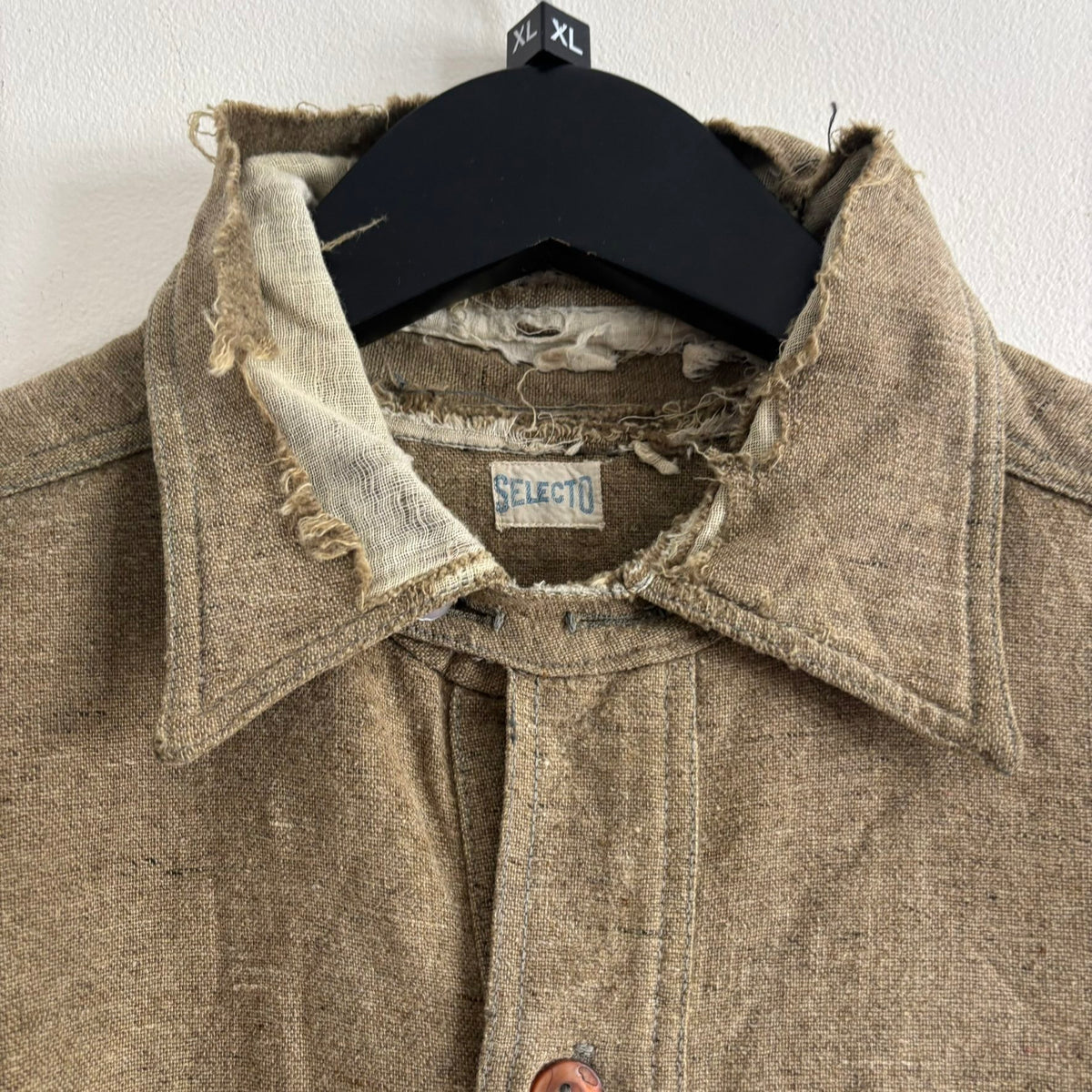 Selecto olive green pullover work shirt with distressed fabric, half-button placket, and chest pocket.