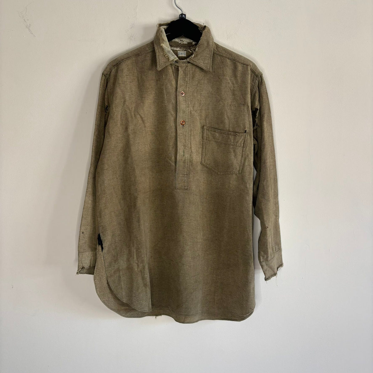 Selecto olive green pullover work shirt with distressed fabric, half-button placket, and chest pocket.