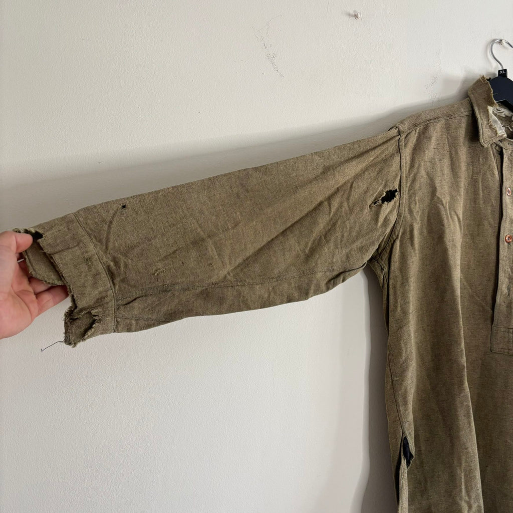 Selecto olive green pullover work shirt with distressed fabric, half-button placket, and chest pocket.