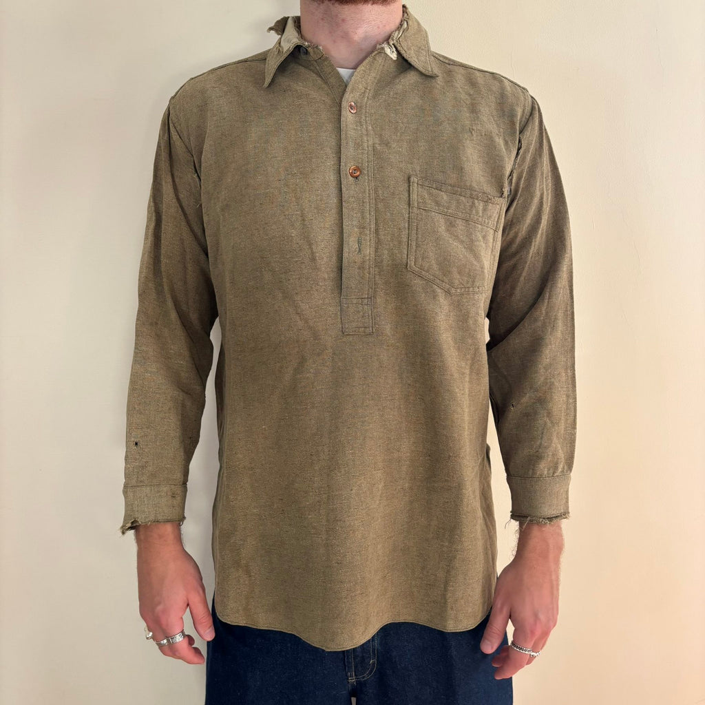 Selecto olive green pullover work shirt with distressed fabric, half-button placket, and chest pocket.