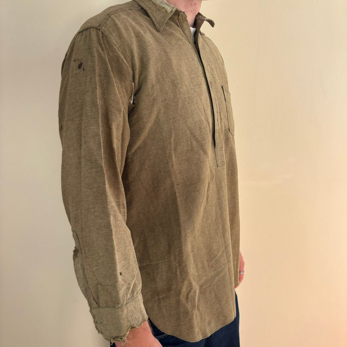 Selecto olive green pullover work shirt with distressed fabric, half-button placket, and chest pocket.