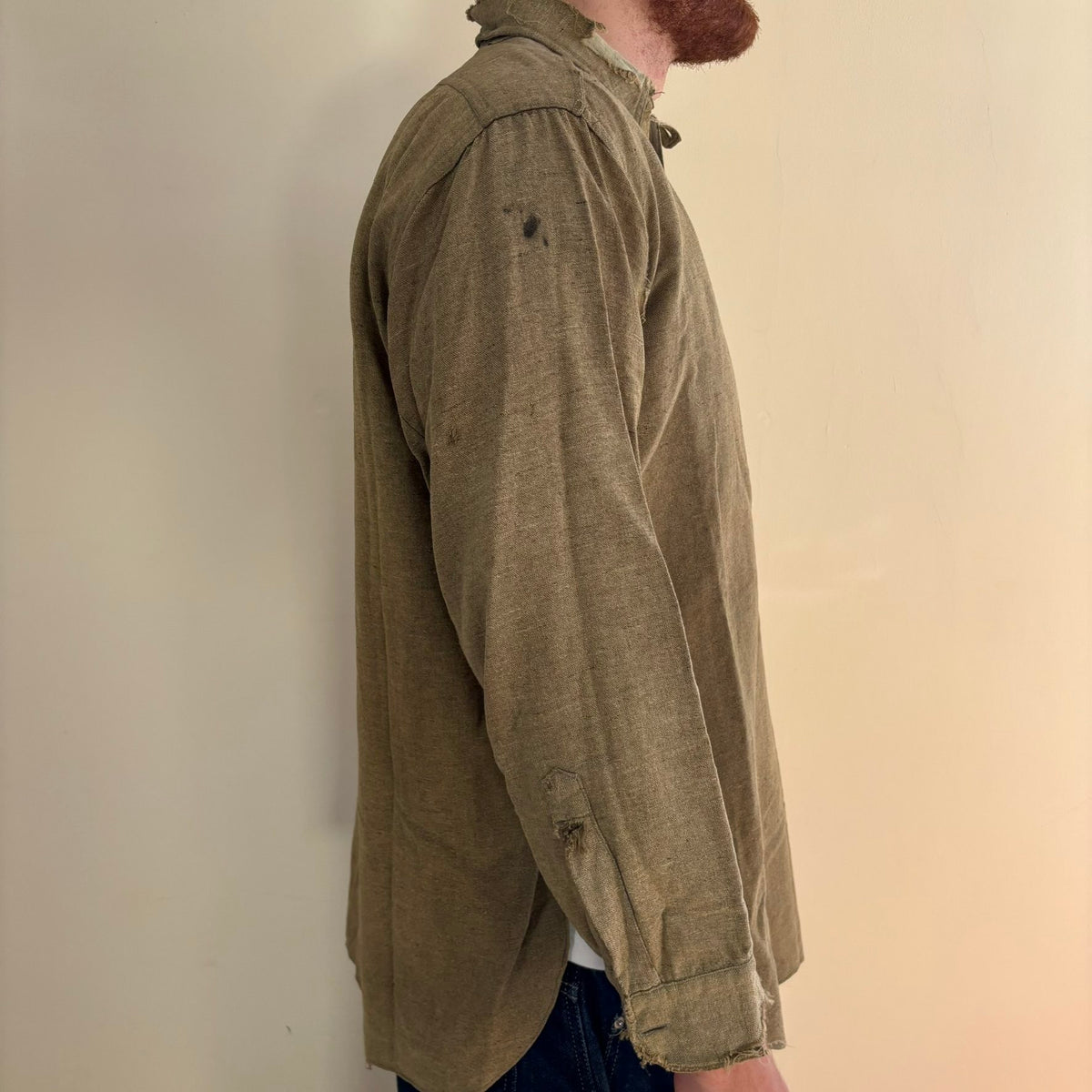 Selecto olive green pullover work shirt with distressed fabric, half-button placket, and chest pocket.