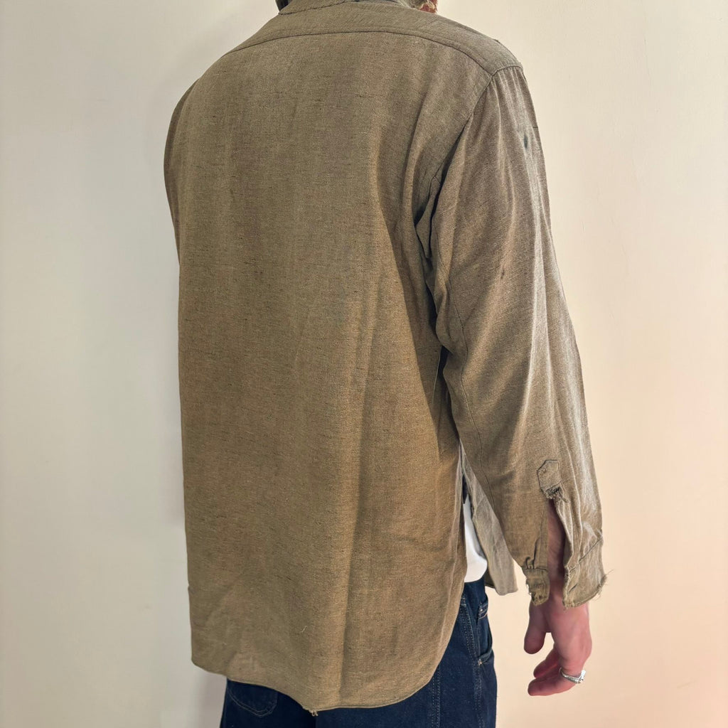 Selecto olive green pullover work shirt with distressed fabric, half-button placket, and chest pocket.