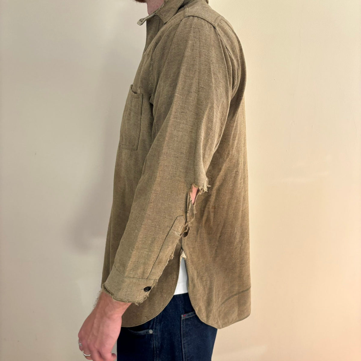 Selecto olive green pullover work shirt with distressed fabric, half-button placket, and chest pocket.