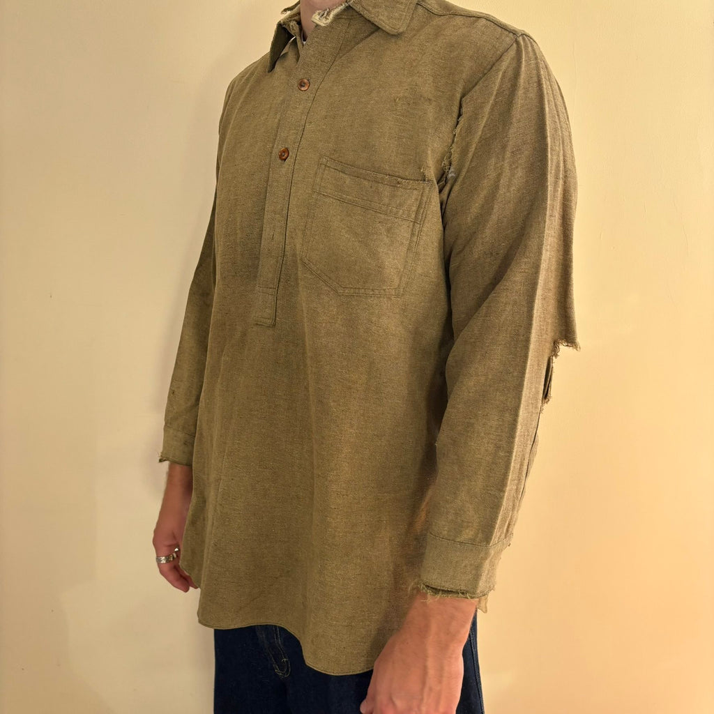 Selecto olive green pullover work shirt with distressed fabric, half-button placket, and chest pocket.