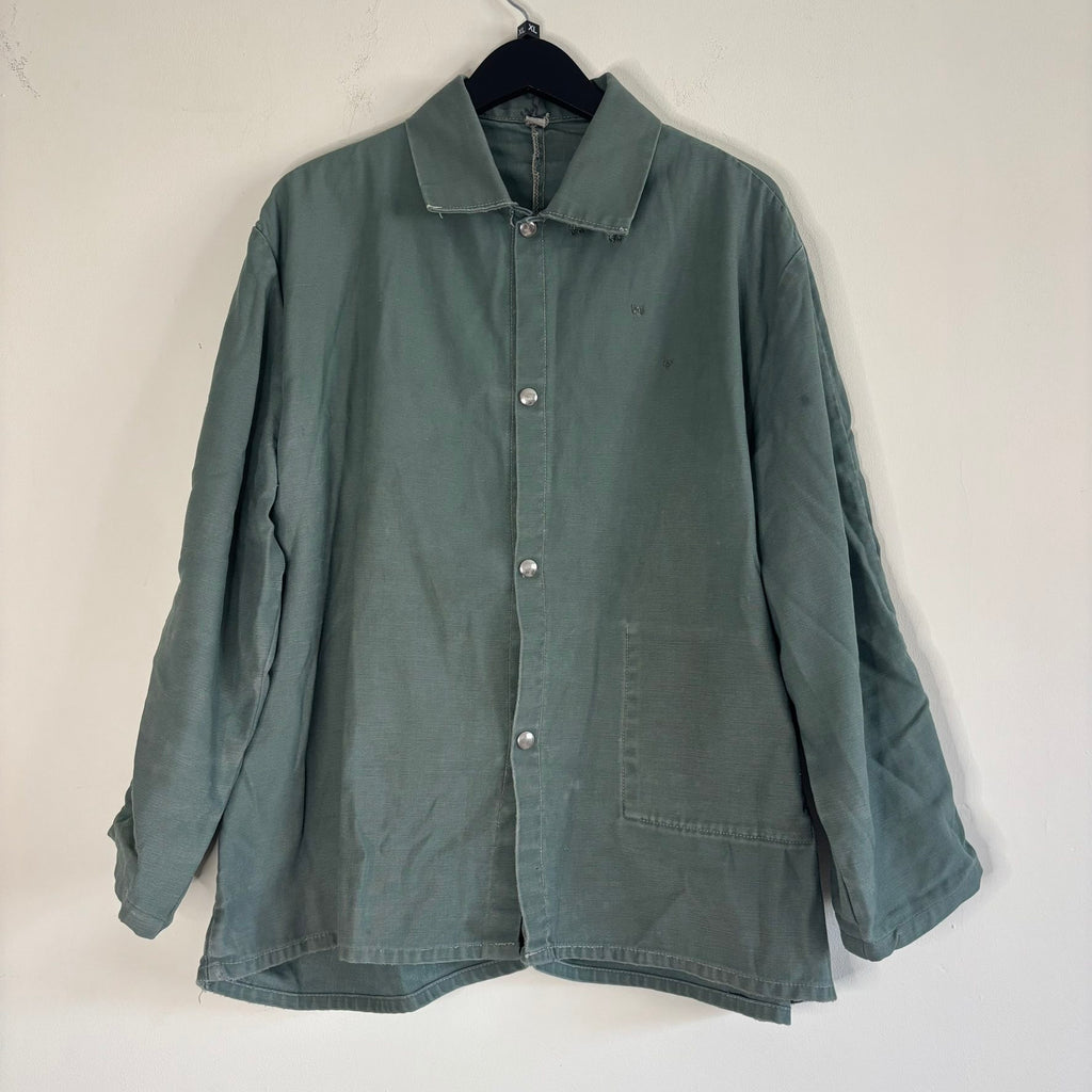Vintage green cotton work jacket with snap front and stencilled "McLOUTH" on back.