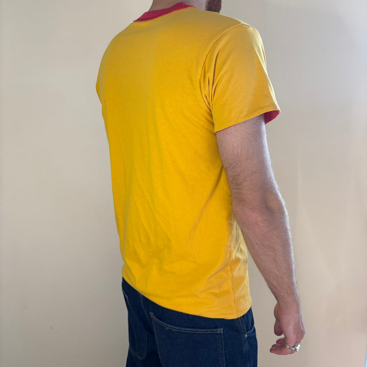Vintage 70s Lincoln Phys Ed reversible shirt red yellow crew neck with contrasting print.