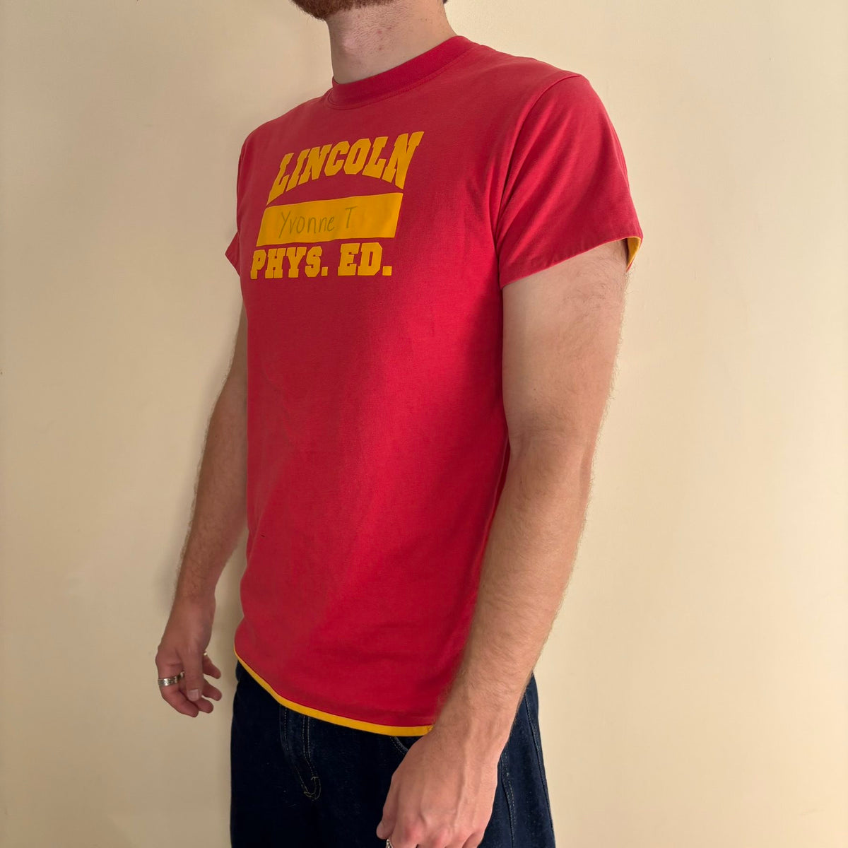 Vintage 70s Lincoln Phys Ed reversible shirt red yellow crew neck with contrasting print.
