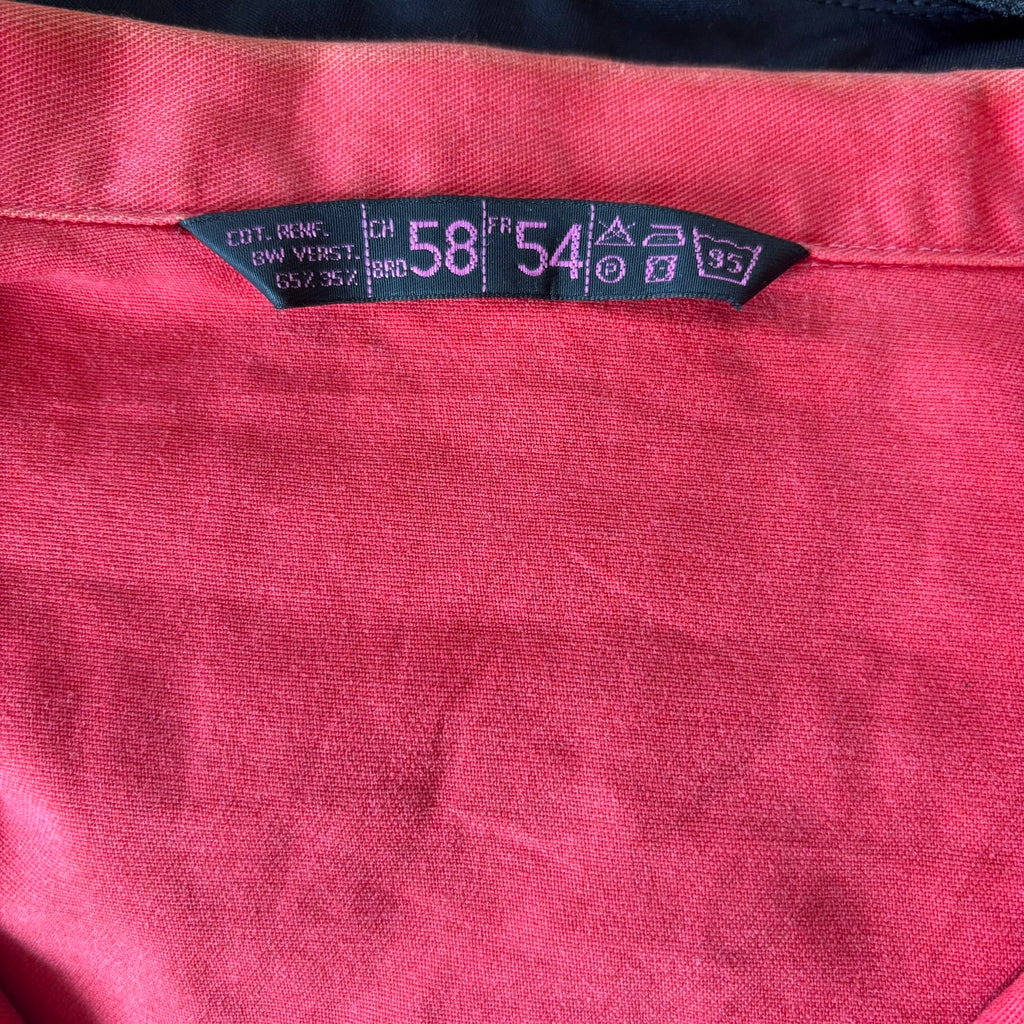 Vintage Euro workwear red chore jacket with faded paint splatters and three-pocket design.