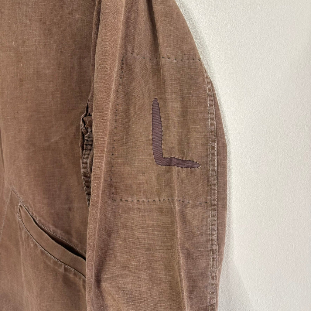 Vintage brown cropped work jacket with pointed collar and CROWN zipper pull.