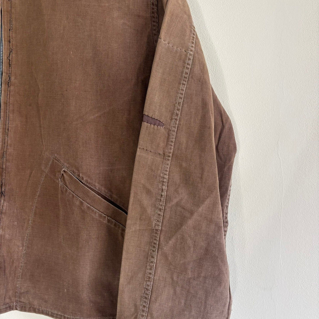 Vintage brown cropped work jacket with pointed collar and CROWN zipper pull.