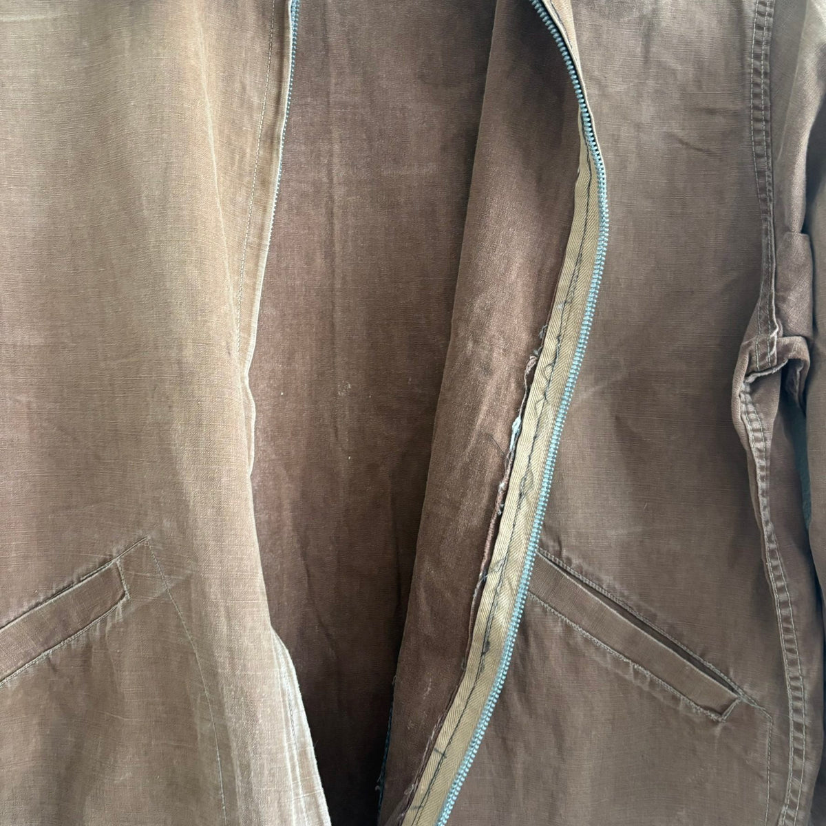 Vintage brown cropped work jacket with pointed collar and CROWN zipper pull.