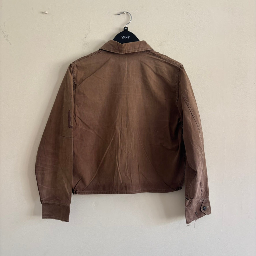 Vintage brown cropped work jacket with pointed collar and CROWN zipper pull.