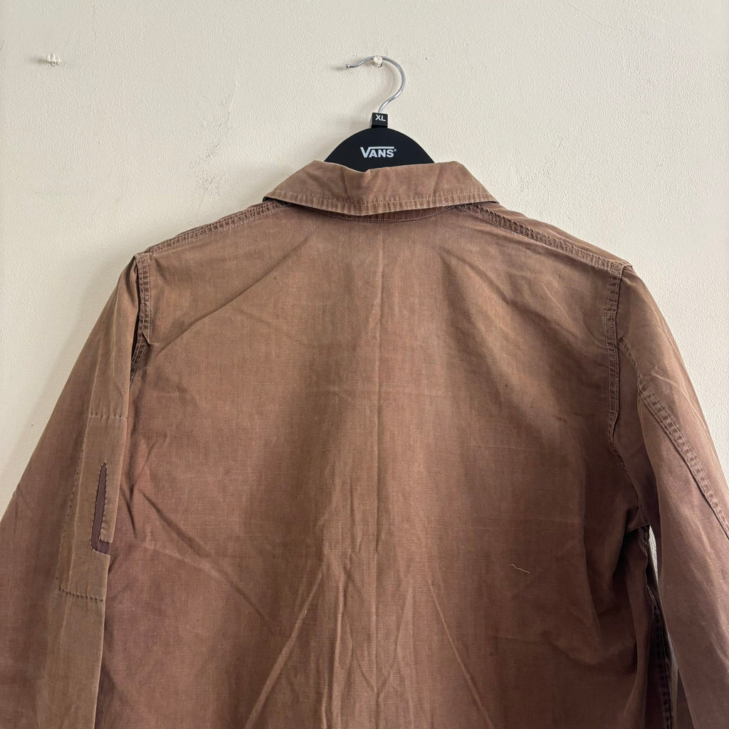 Vintage brown cropped work jacket with pointed collar and CROWN zipper pull.