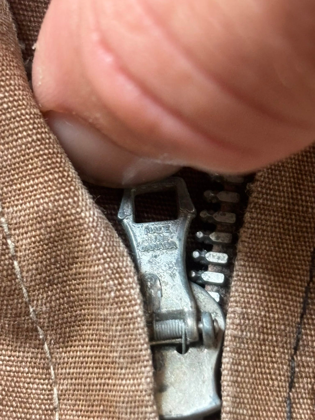Vintage brown cropped work jacket with pointed collar and CROWN zipper pull.