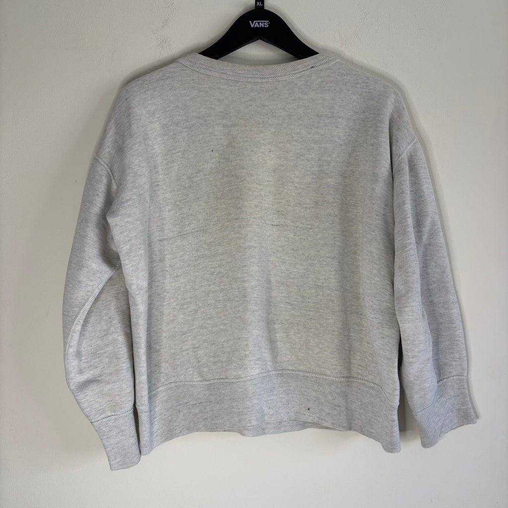 Russell Athletic grey crewneck sweatshirt with single V neck, ribbed details, and vintage tag.